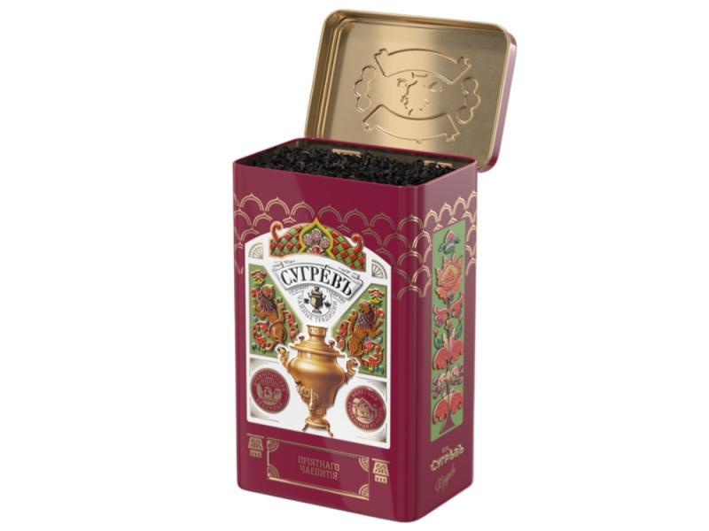 Черный чай и имбирное печенье в подарочной упаковке